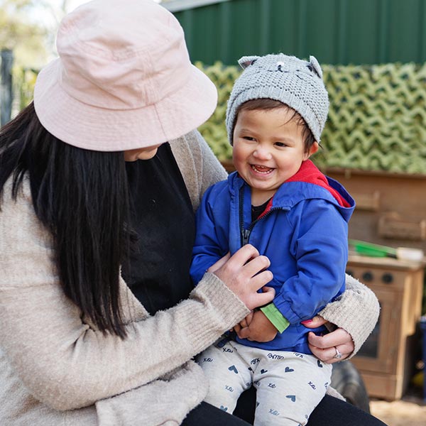 team member with infant